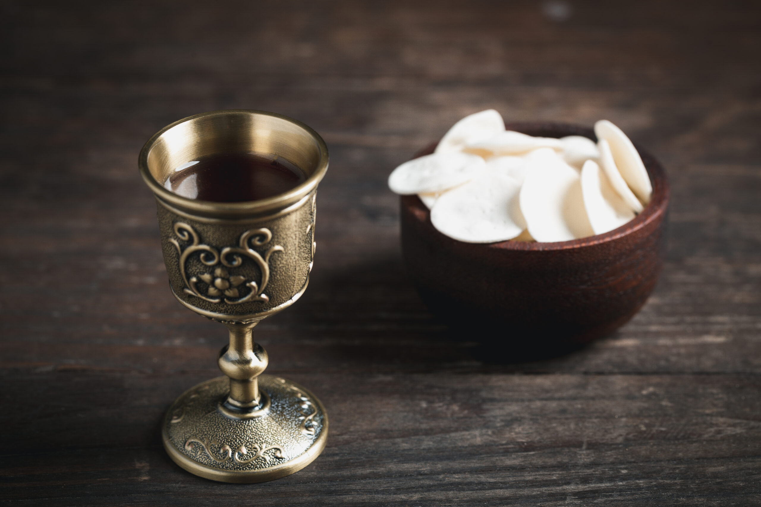 Concept of Eucharist or holy communion of Christianity. Eucharist is sacrament instituted by Jesus. during last supper with disciples. Bread and wine is body and blood of Jesus Christ of Christians.